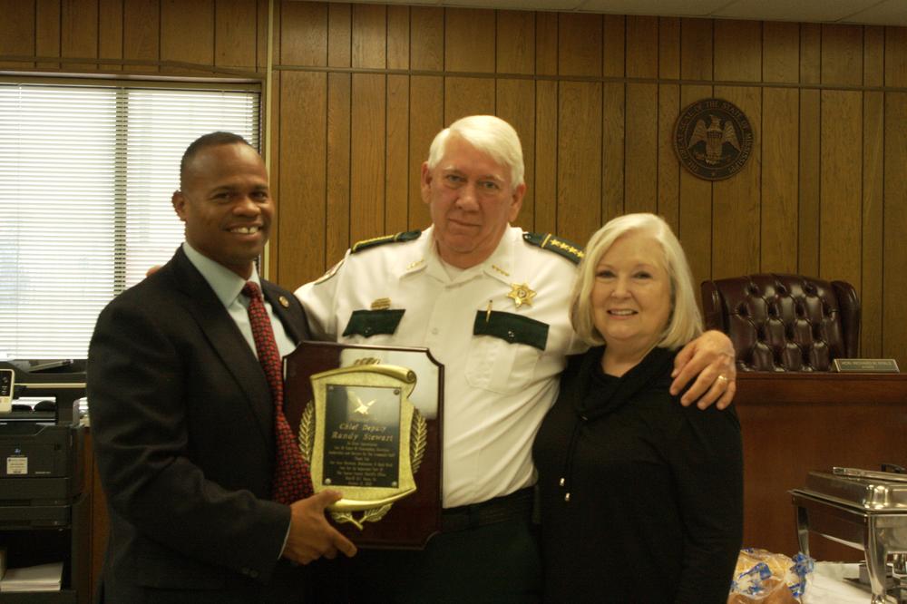 Sheriff Hamps presenting a plaque.
