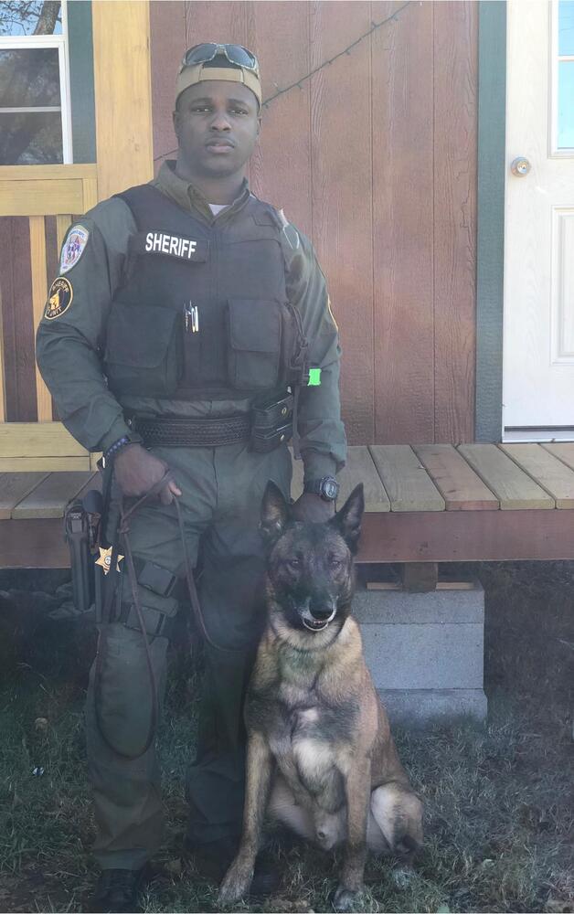 Blade next to an officer.