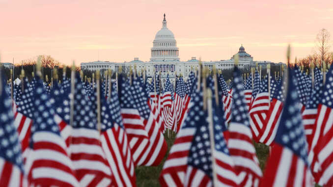 inauguration with flags and capitol in background