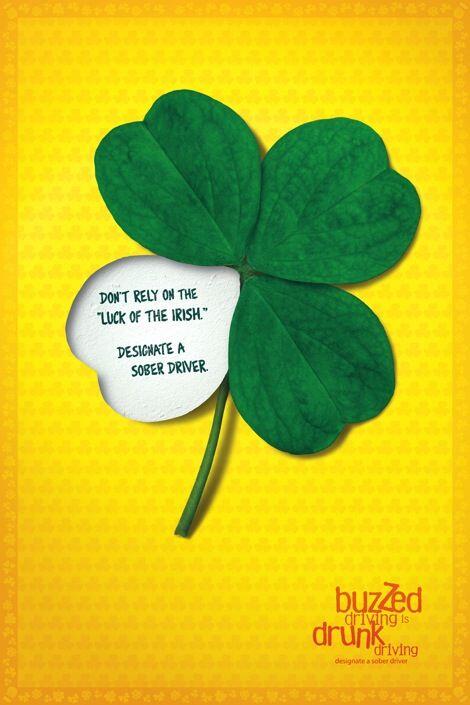 four leaf clover with yellow background with message to drive sober